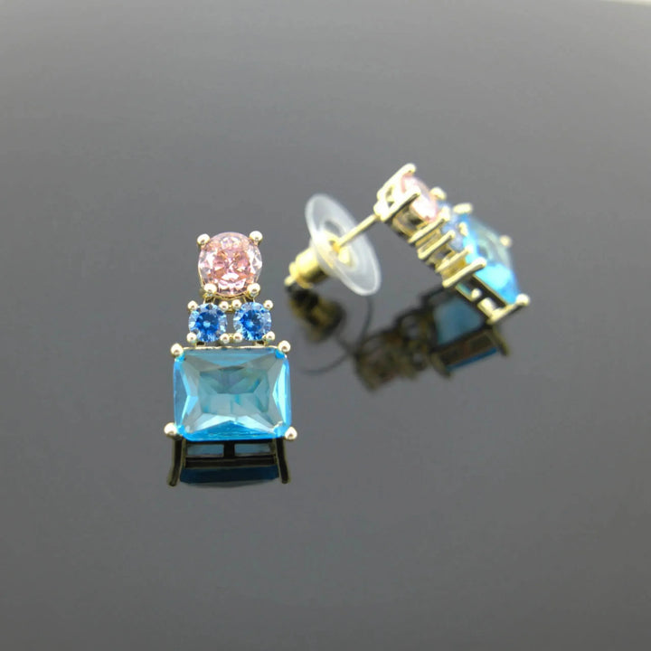 Gold-colored earrings with pink and blue zirconias