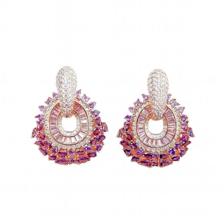 Rose gold-colored earrings with pink zirconias