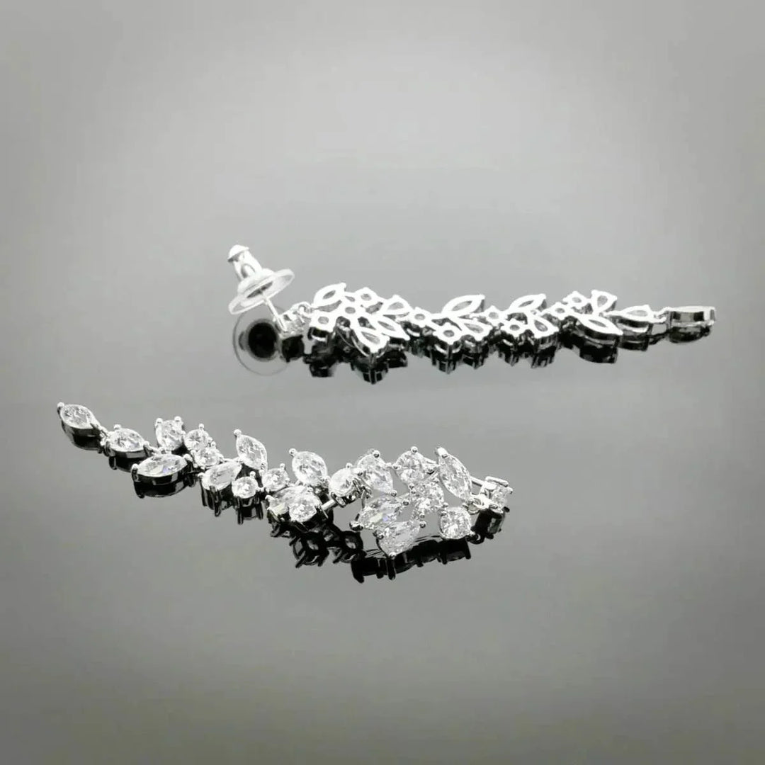 Silver-colored leaf dance earrings with zirconia