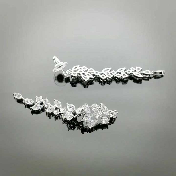 Silver-colored leaf dance earrings with zirconia