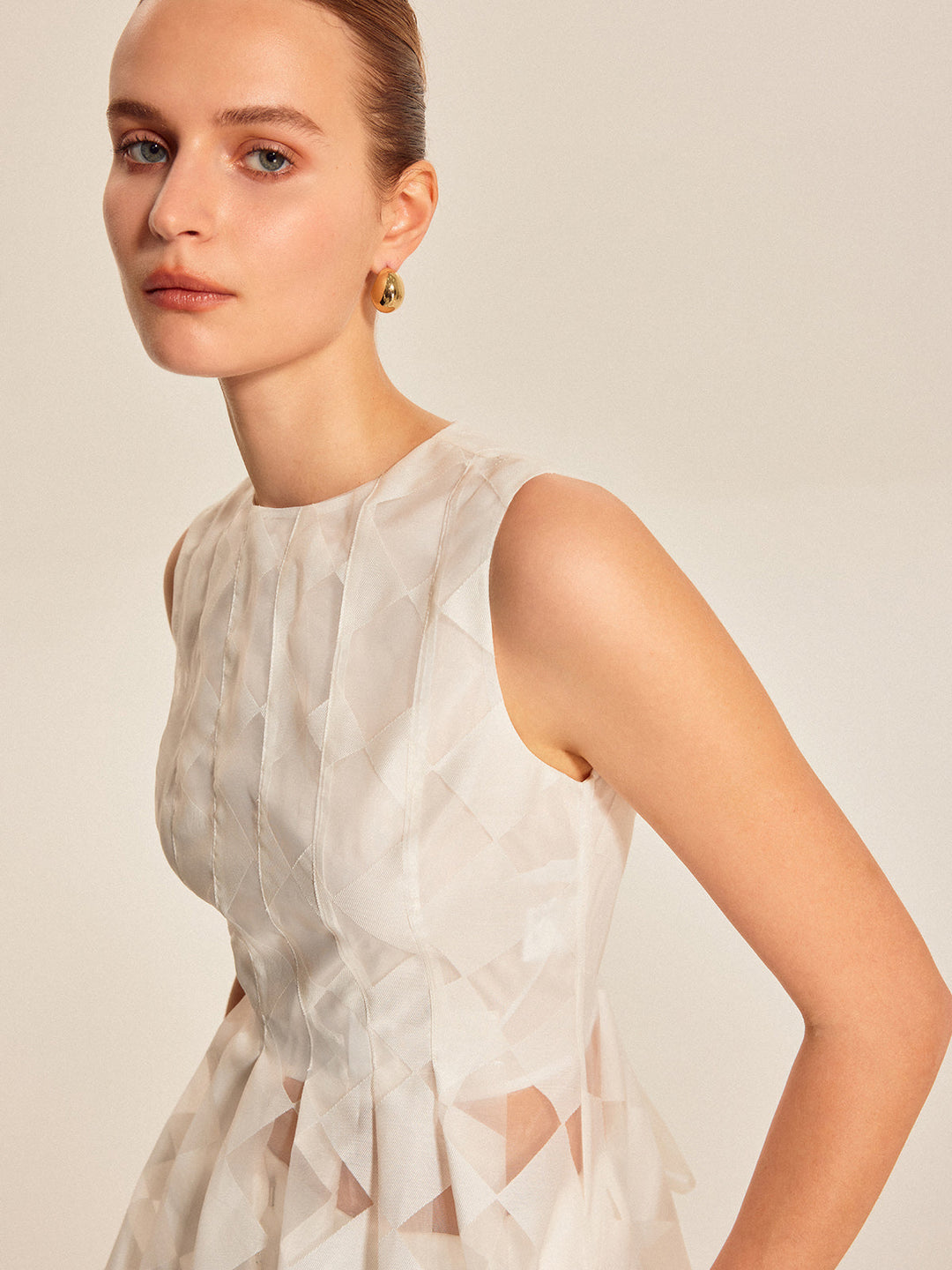 Semi-Sheer Geometric Peplum Top
